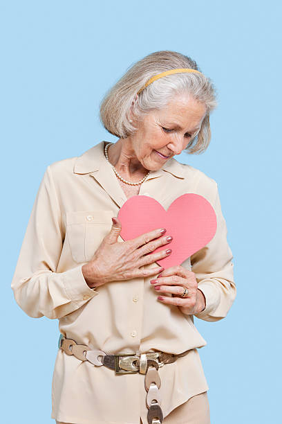 istock Senior woman studio portrait 506977373