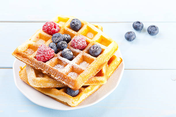 istock Homemade waffles with fruit 506977737