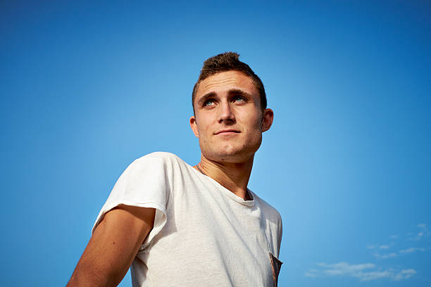 istock portrait of a young man waiting something 506979395
