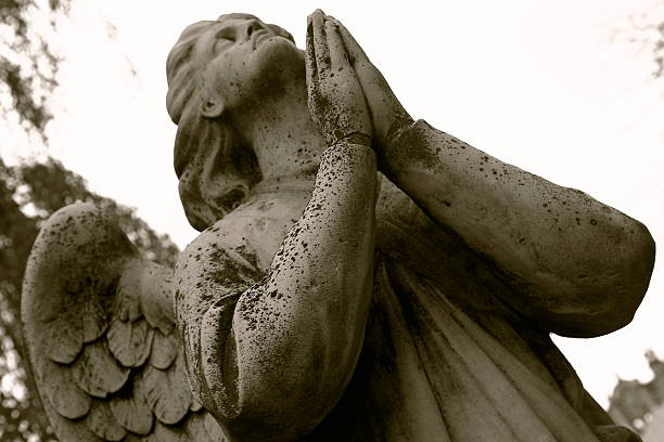 istock Angel praying at Novodevichy Convent - Moscow, Russia 506980147