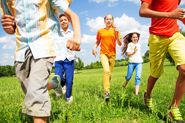 istock Running children together in motion outside 506980293