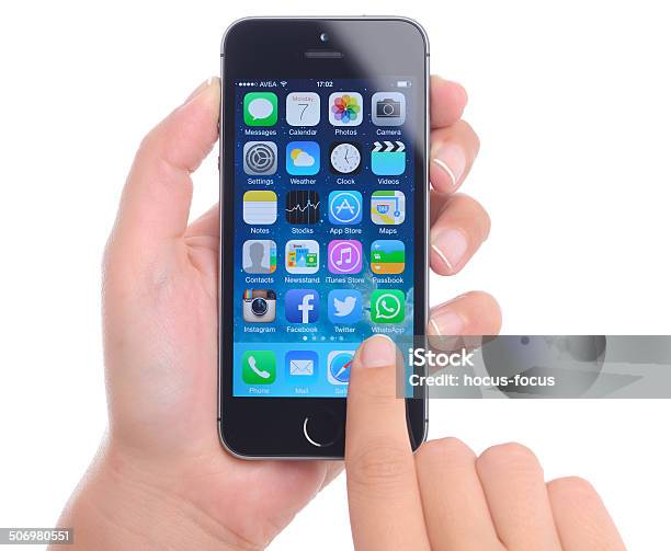 Hand Holding Iphone 5s Stock Photo - Download Image Now - Cut Out, Portable Information Device, Single Object