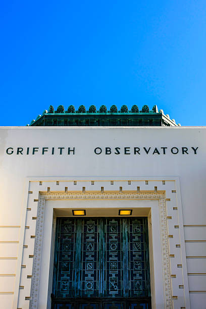 The Griffith Park Observatory in Los Angeles CA Los Angeles, CA, USA - July 2nd, 2015: View of the art deco style architecture around the entrance to Griffith Observatory in Griffith Park, Los Angeles CA griffith park observatory stock pictures, royalty-free photos & images