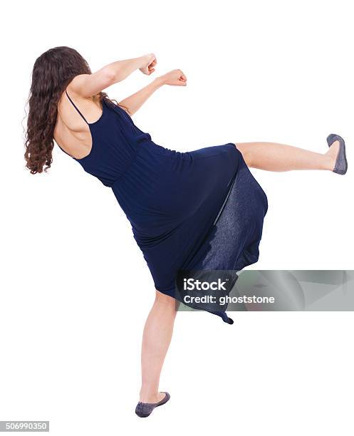 Curly Woman Funny Fights Waving His Arms And Legs Stock Photo - Download Image Now - Adult, Aggression, Anger