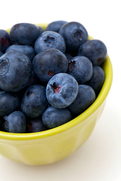 istock blueberries in a green bowl 506990766