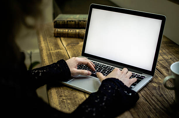 istock Typing on a laptop at the office desk 506991542