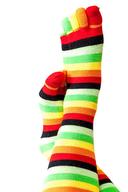 istock Funny colored socks female legs 506991938