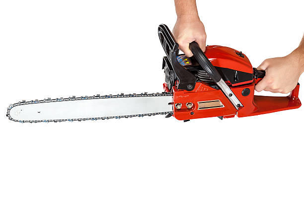 istock Gasoline chain saw in hand. 506992022