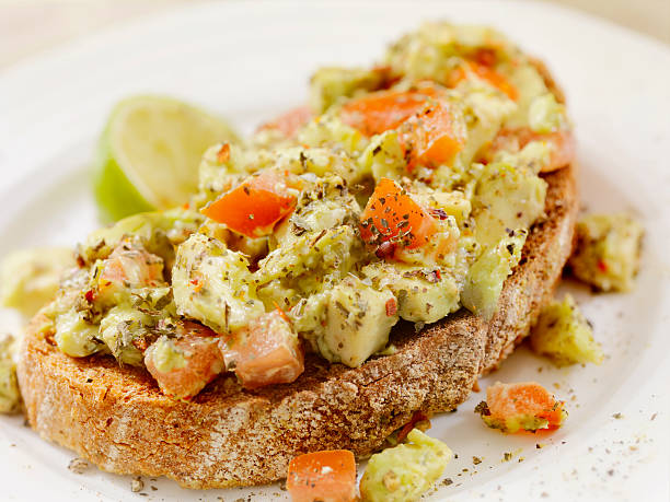 istock Avocado Toast with Tomatoes on Rye Bread 506992044