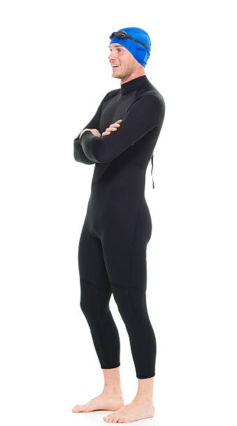 istock Smiling swimmer standing with arms crossed 506992636