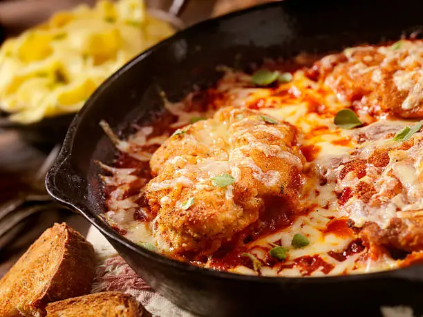 Photo of Chicken Parmesan Baked in Tomato Sauce with Mozzarella Cheese