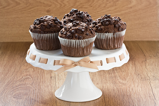 Chocolate chip muffins delicious sweet dessert on wooden background
