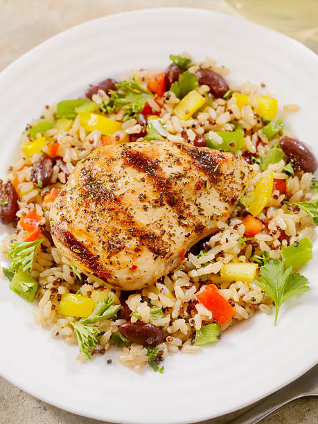 istock Grilled Chicken with Quinoa and Brown Rice Salad 506993760