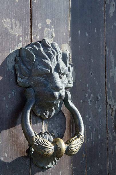 istock Old iron handle in the shape of lion 506994688