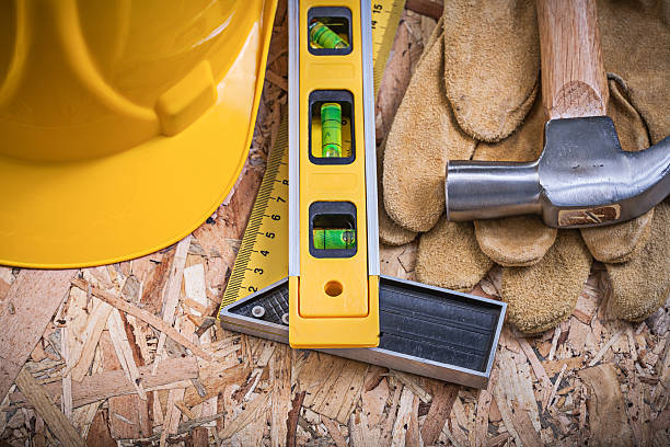 istock Square ruler construction level claw hammer building helmet leat 506994934