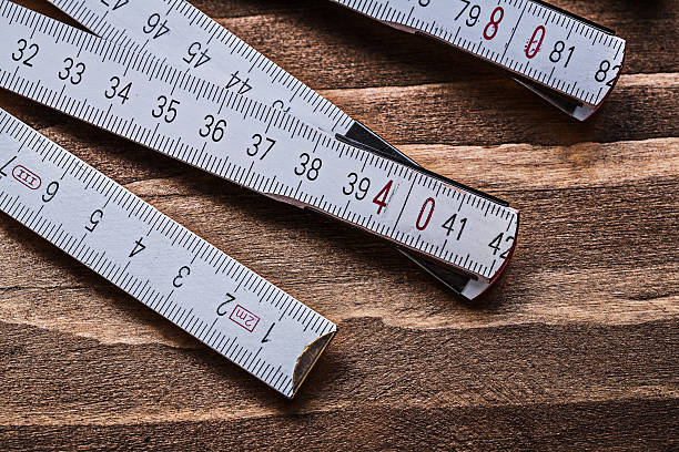 istock White wooden meter on wood board horizontal view construction co 506995246