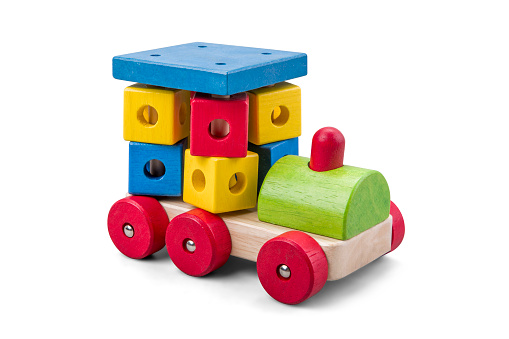 Wooden car toy with colorful blocks isolated over white with clipping path
