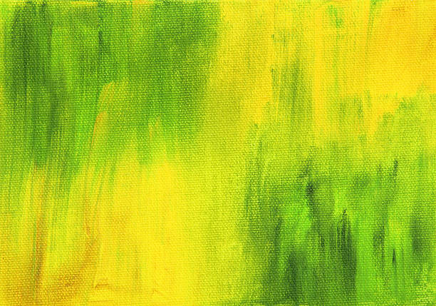 istock Canvas painted background in shades of green and yellow 506996388
