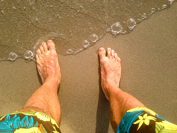 feet on the sand feet on the sand personal perspective standing stock pictures, royalty-free photos & images