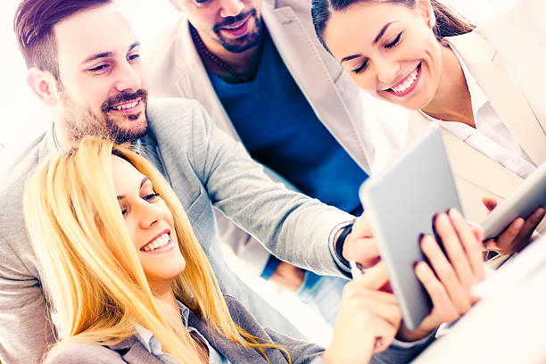 istock Group of business people discussing 506998252