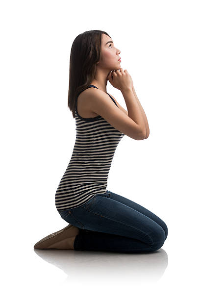 istock Young woman kneeling down 506999690