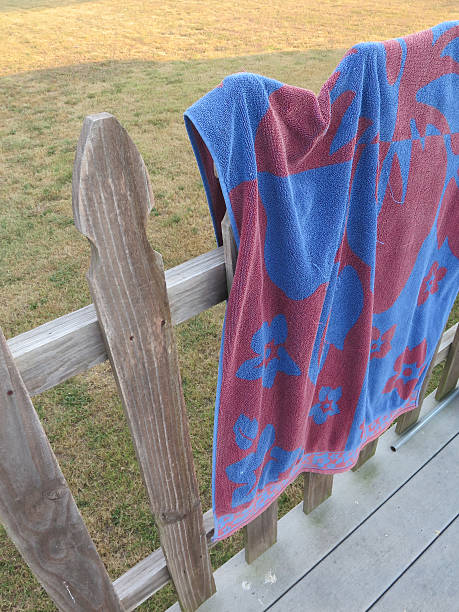 istock Pool Towel Hanging on a fence 507001096