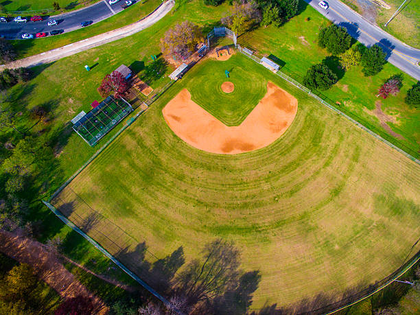 Aerial View Baseball Field Over Austin Texas. A Classic American Sport. Looking directly over the top of a Baseball field , pitchers mound , 1st base , 2nd base , 3rd base , home base , Over the top of Baseball Field outside of the capital city of ATX