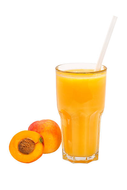 istock Peach juice in a tall glass 507004895