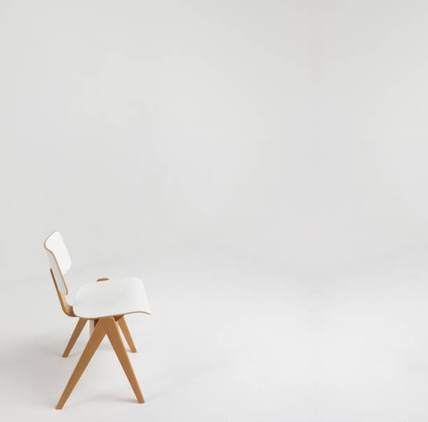 istock white wooden chair in an empty room 507005407