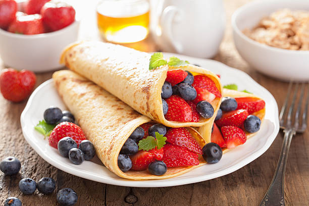 istock pancakes with strawberry blueberry for breakfast 507007413