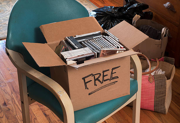 box of free CDs and DVDs stock photo