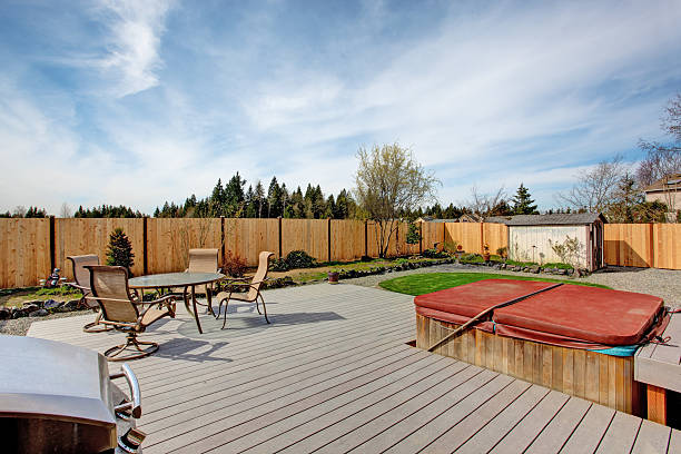 istock Walkout deck with patio area and hot tub 507008329
