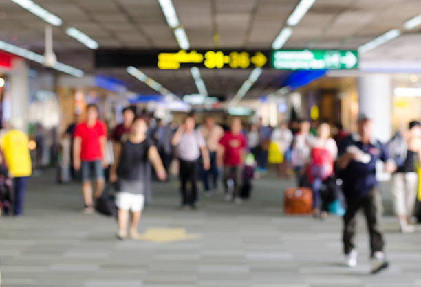 Passengers in Airport on blur background
