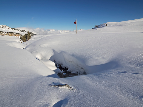 Outdoor photography of an alpine winter landscape.