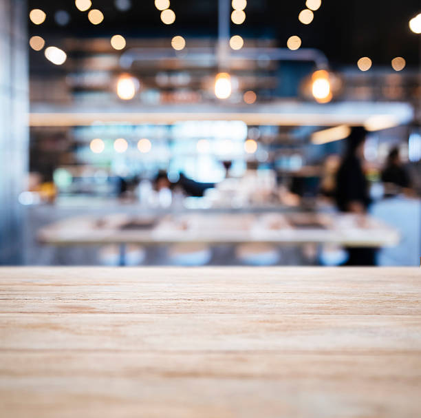 istock Table top Counter with Blurred People Restaurant Shop interior 507025218