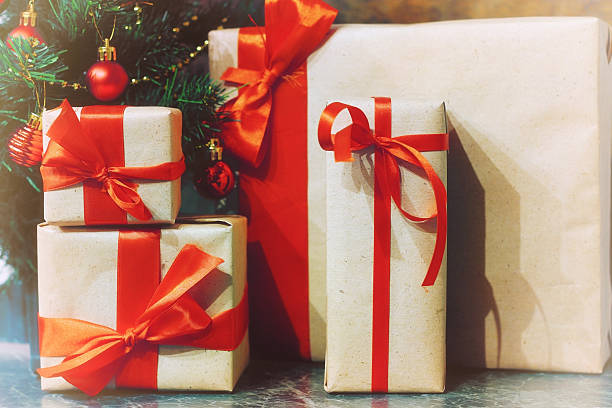 istock stack of gifts under a Christmas tree 507025486