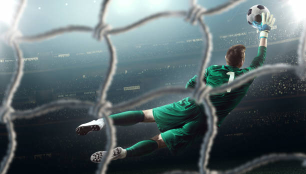 jogo de futebol momento com goleiro - soccer stadium kicking goal - fotografias e filmes do acervo