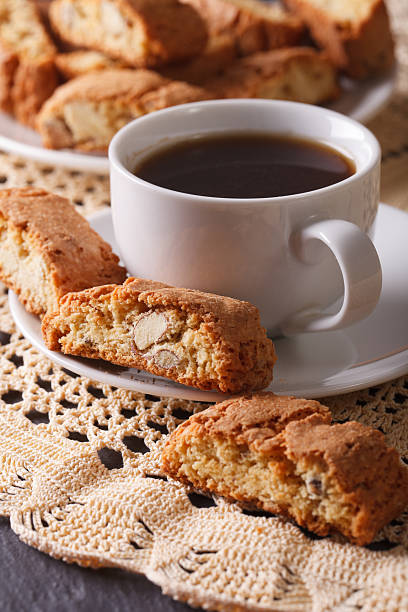 istock Black coffee and Italian cookies cantuccini macro. vertical 507027838