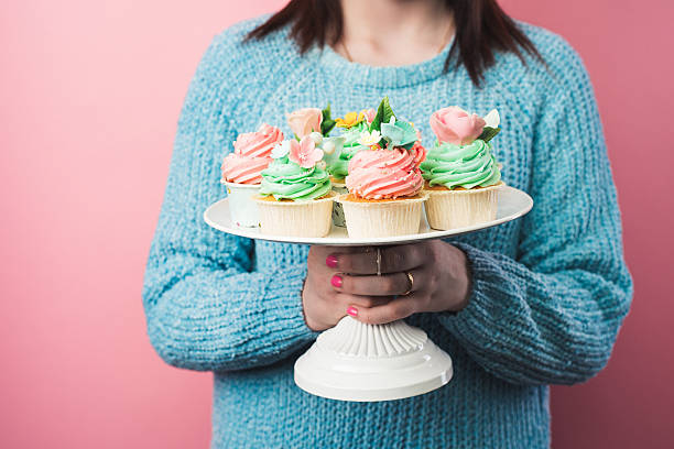 istock Girl with cute cupcakes 507028956