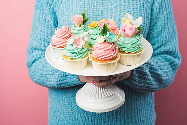 istock Girl with cute cupcakes 507029062