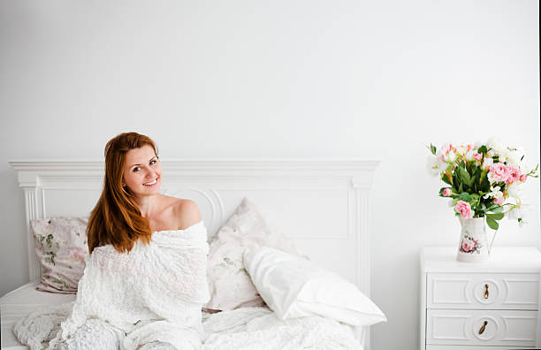 istock Young beautiful woman waking up fully rested 507031758