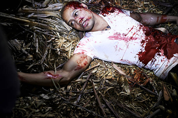 His last moment A cropped shot of a murder victim found outdoors dead person photos stock pictures, royalty-free photos & images