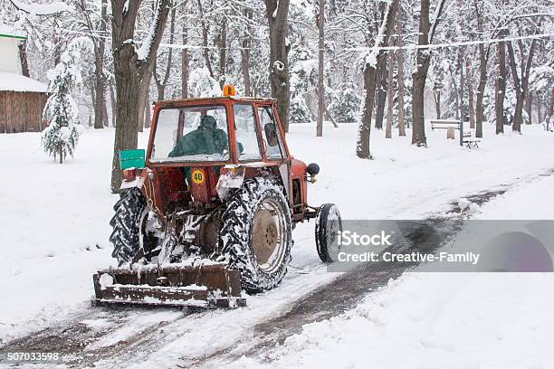 Dredge Cleaning The Roads From The Snow Stock Photo - Download Image Now - Agricultural Machinery, Backhoe, Blizzard