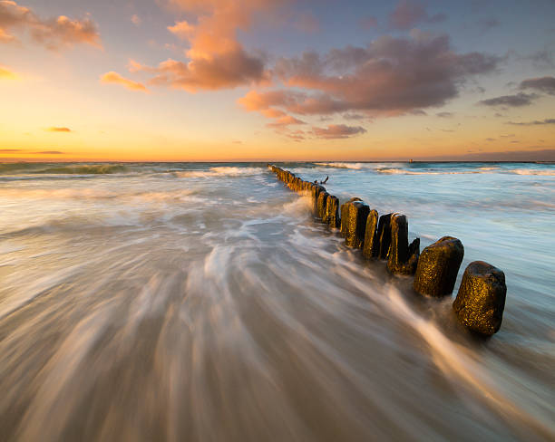 istock sunset over the sea beach 507033944