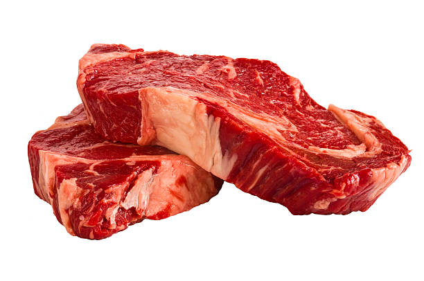 istock Ribeye steaks isolated on white background 507034133