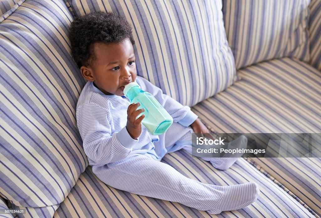 Nice this is the way to relax Shot of an adorable little baby boy at home Baby - Human Age Stock Photo