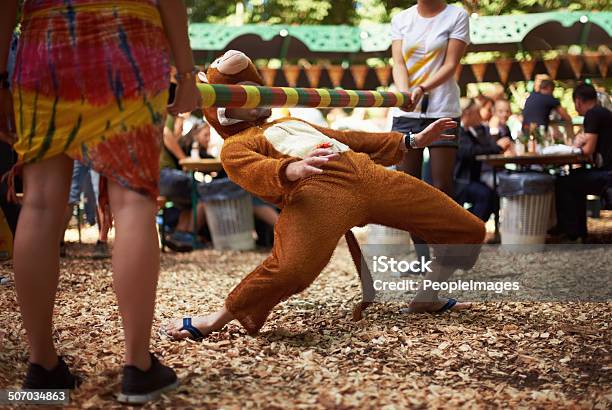 Monkeying Around Stock Photo - Download Image Now - Humor, Bizarre, Limbo Dancer