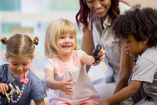 istock Sharing Toys Together in Preschool 507034948
