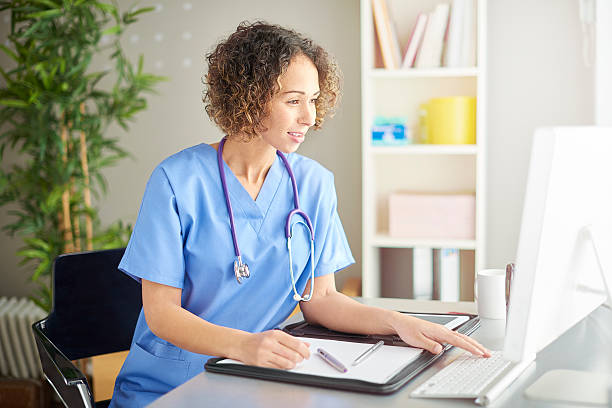 istock female doctor sitting at her desk 507035086
