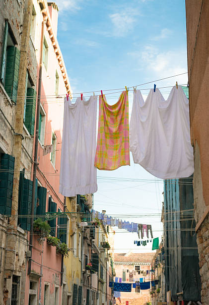 istock Lines of drying laundry in Venice, Italy 507037038
